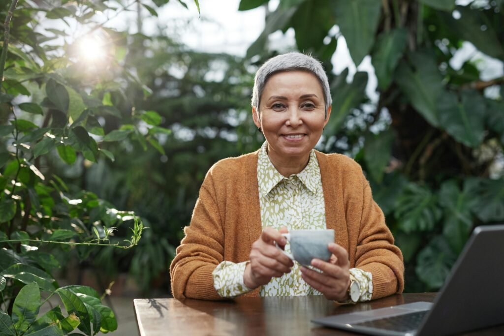 A lady having tea at garden